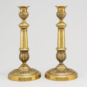 A pair of Empire bronze candlesticks, first half of the 19th century.