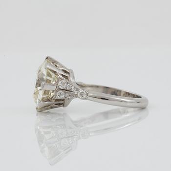 An old-cut, slightly cushion-shaped diamond, ca 5.70 cts. Quality circa L/SI.