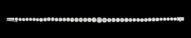 A white gold and diamond bracelet.