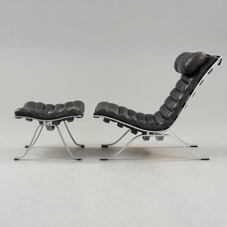 Arne Norell, an 'Ari' steel and black leather lounge chair with ottoman, Norell, Sweden.