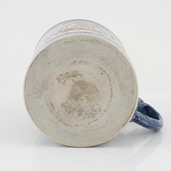 A large famille rose tankard, Qing dynasty, 18th Century.