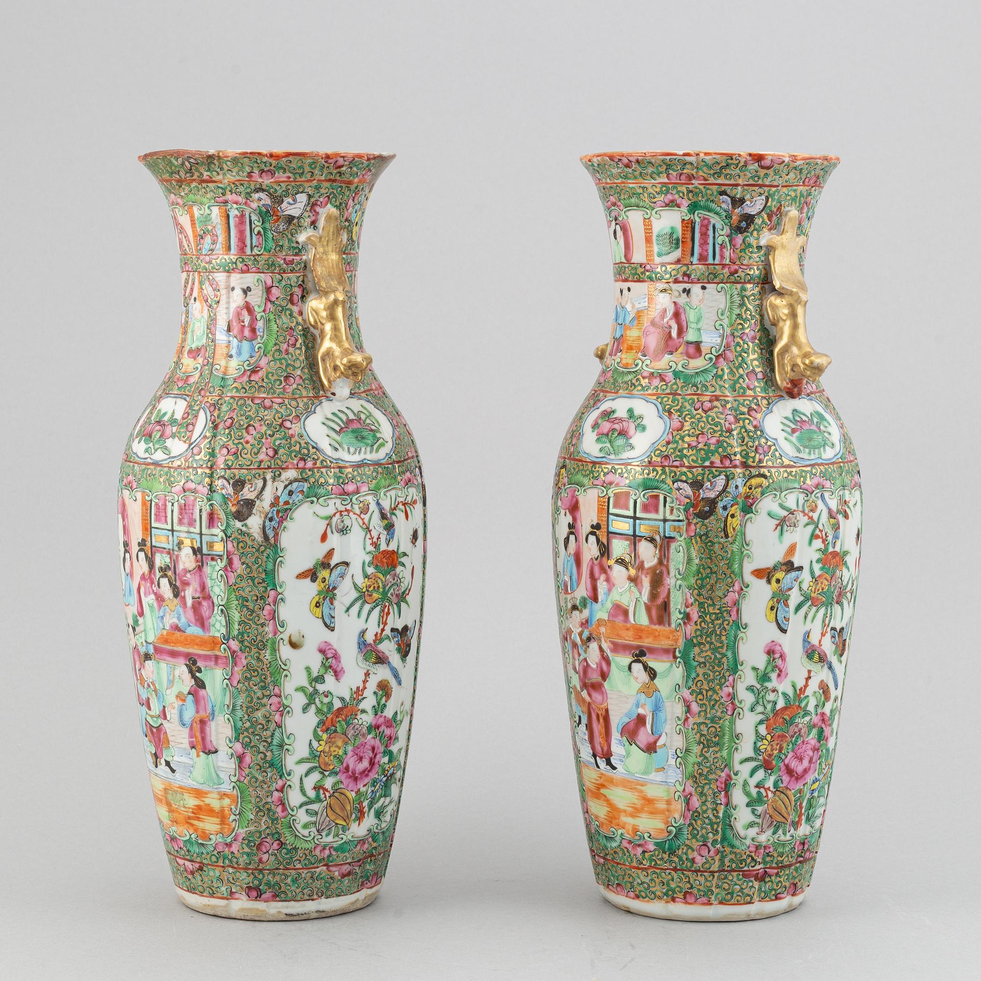 A pair of famille rose canton vases, Qing dynasty, late 19th century.