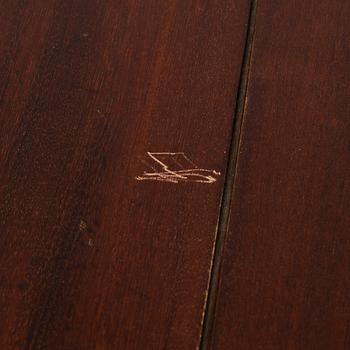 An 18th century English drop-leaf table.