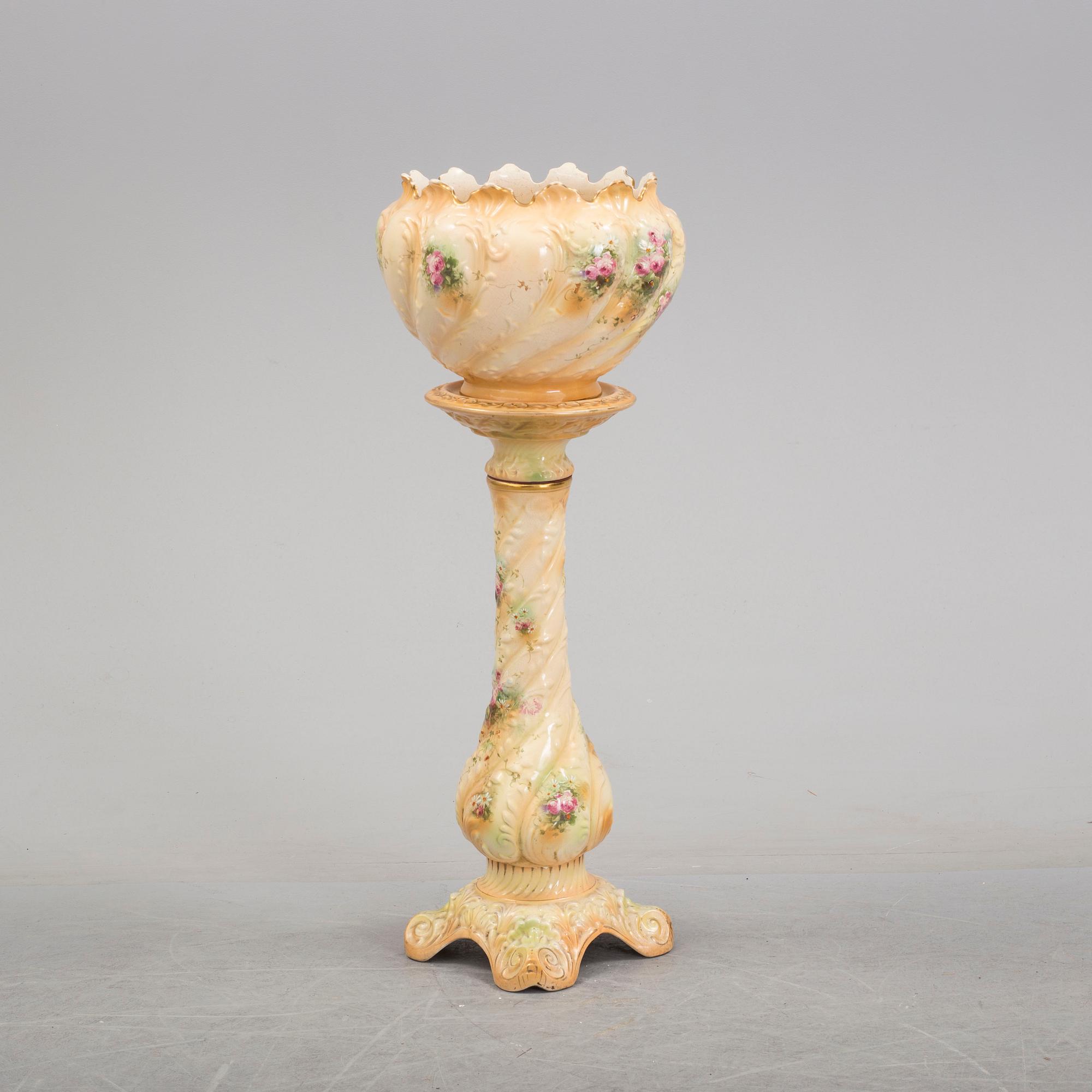 An early 20th century pedestal and flowerpot.