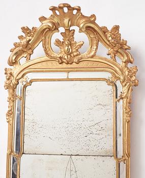A Rococo giltwood mirror by N. Meunier (master in Stockholm 1754-97).