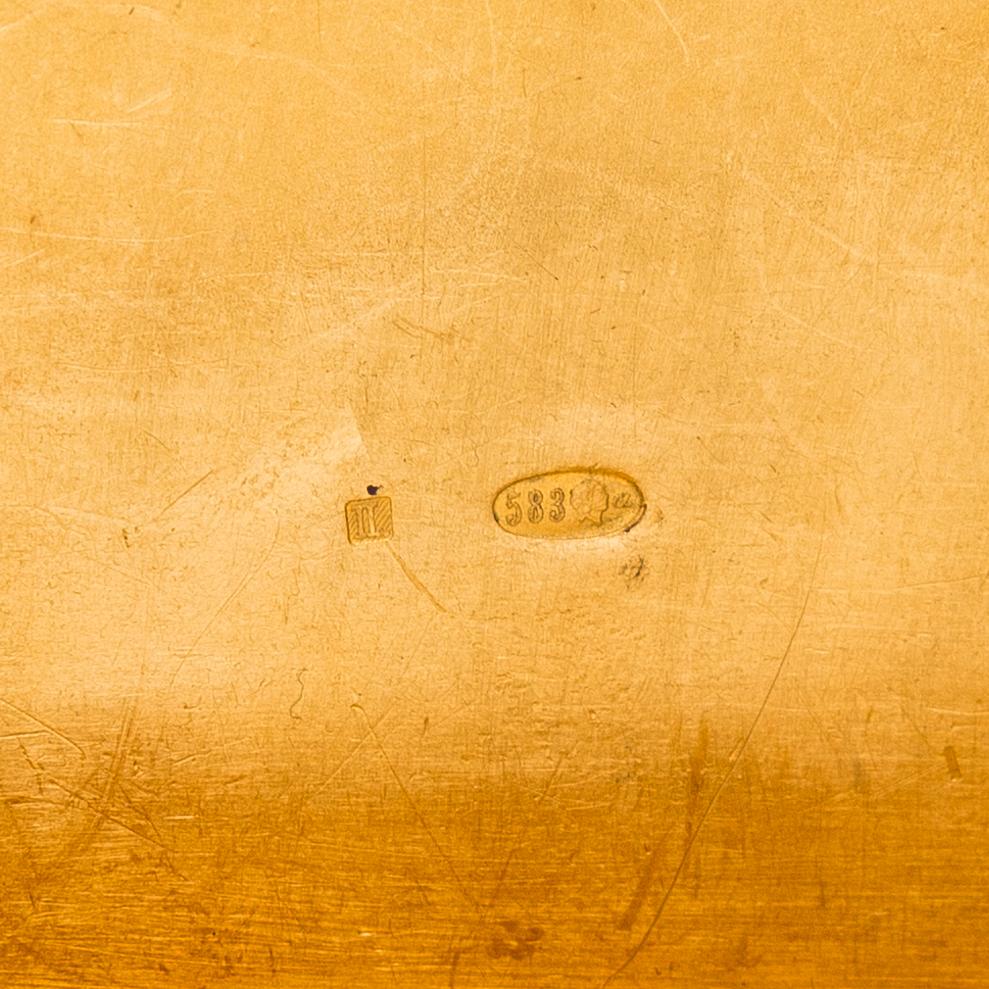 A 14K gold cigarette case with rubies. St- Petersburg, second quarter of the 20th century.