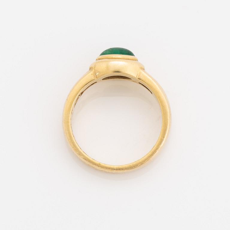 18K gold, cabochon cut emerald and brilliant cut diamond ring.