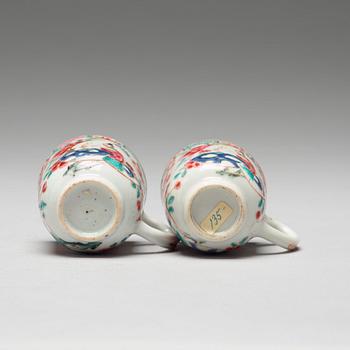 A pair of famille rose cups with dishes, Qing dynasty, Yongzheng (1723-35).