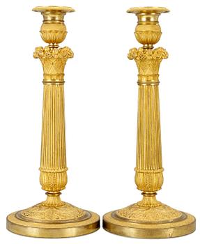 963. A pair of Empire candlesticks.