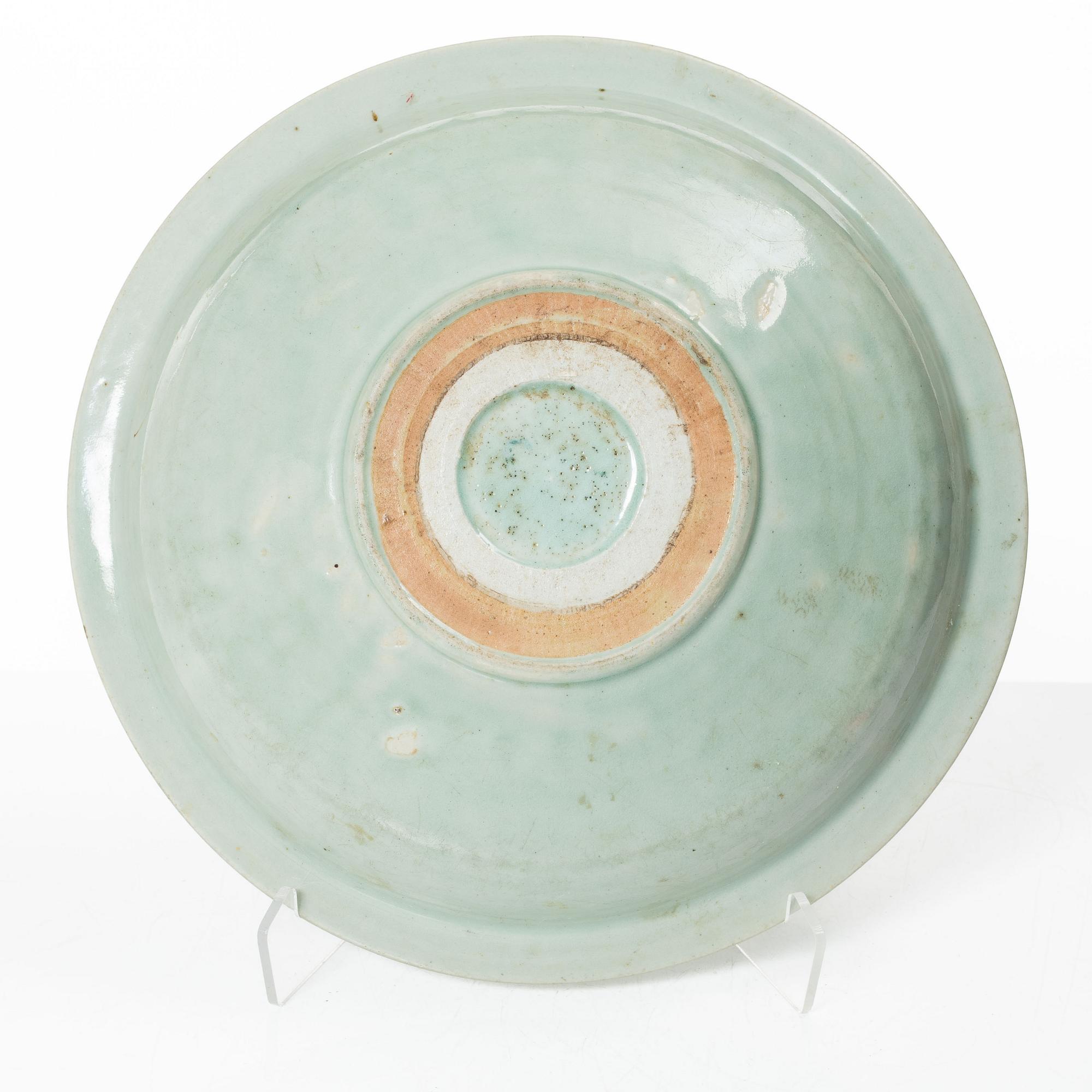 A Chinese celadon dish, Ming dynasty (1368-1644).