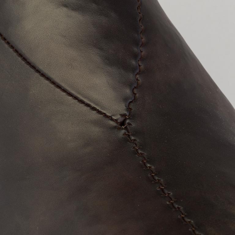 DIMITRI OMERSA & CO, a leather stool in the shape of a bull.