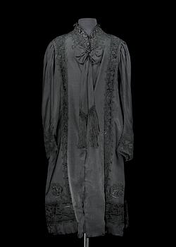 A late 19th cent black silk evening gown.