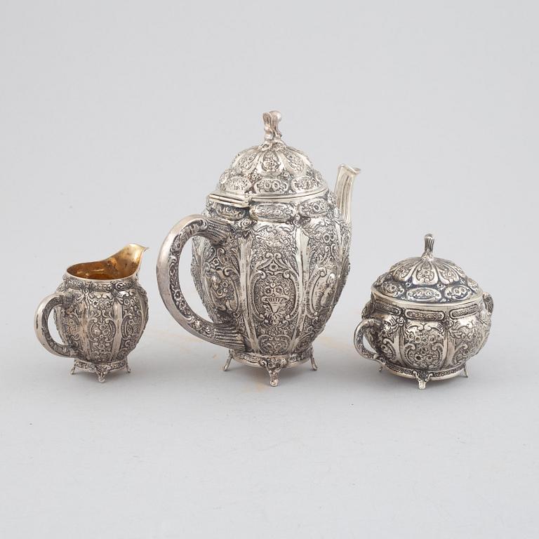 E.Jäntti, four silver cups, a three-piece silver coffee service and a silver tray, Helsinki, Finland,1979-81.