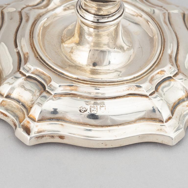 A pair of silver candlesticks, mark of William Hutton & Sons Ltd, London 1900.