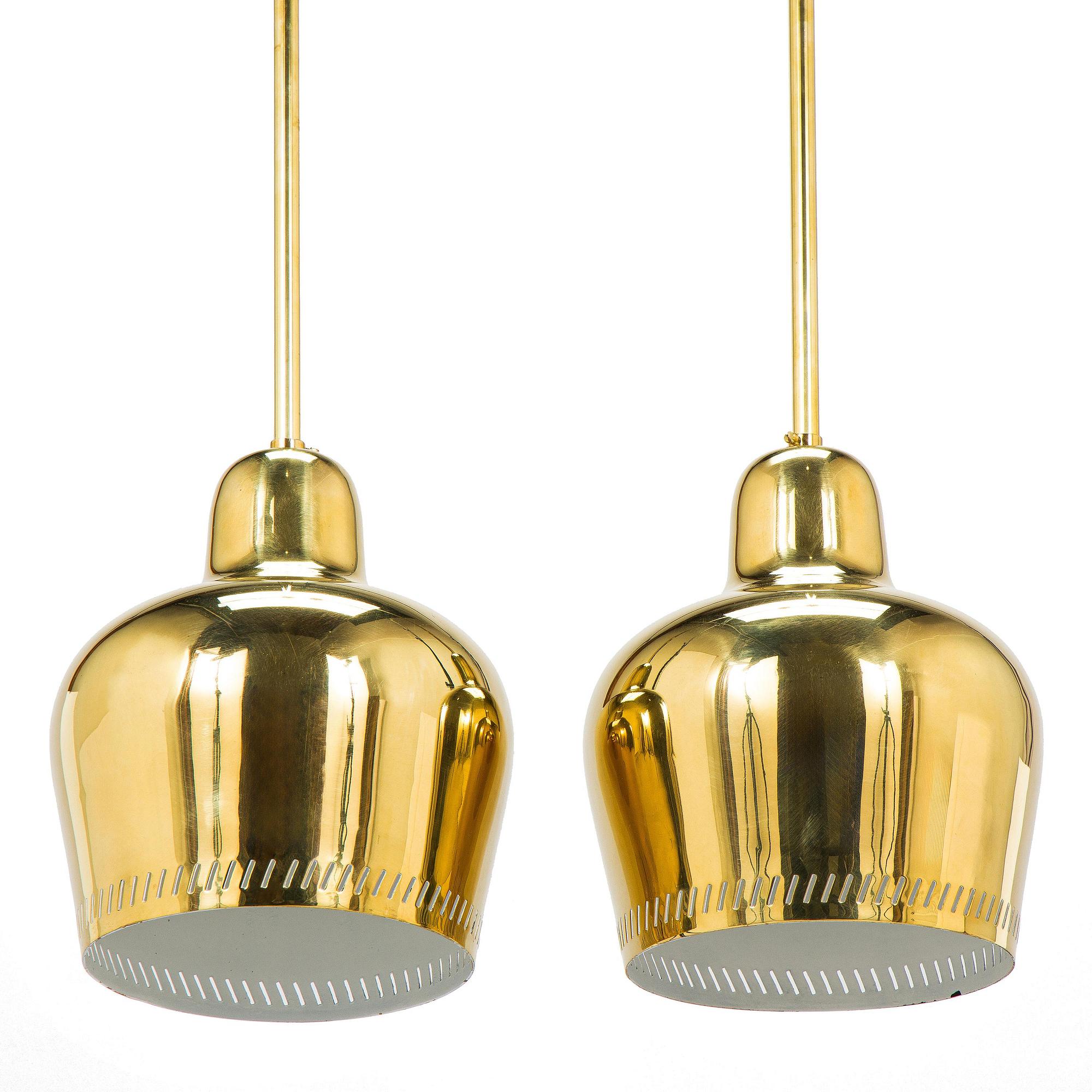 Paavo Tynell, a pair of mid 20th century ceiling lights, model 1699, for Taito / Idman.