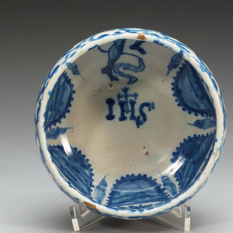 A Spanish faience blue and white bowl. Marked Talavera, presumably 18th Century.