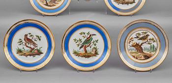 A set of 10 French ornitological dessert plates, signed Schoelber, 19th Century. (8+2).