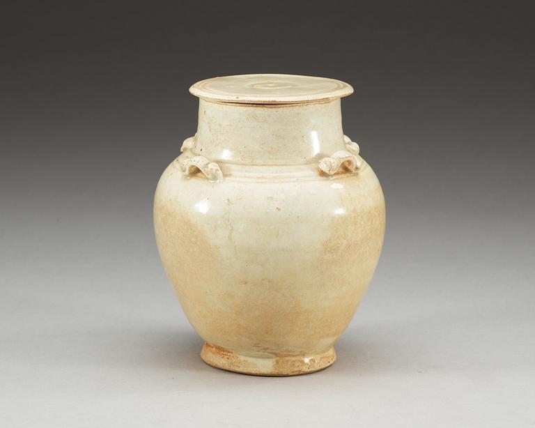 A pale green glazed jar with cover, Song dynasty (960-1279).