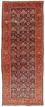 A Farahan carpet, c. 520 x 205 cm.