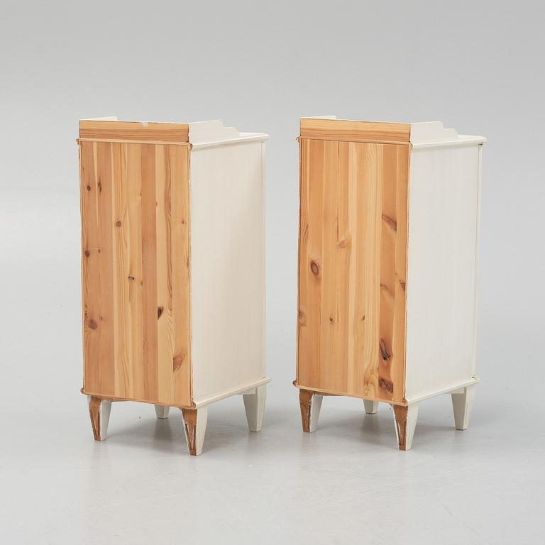 A pair of Gustavian style bedside tables, late 20th century.