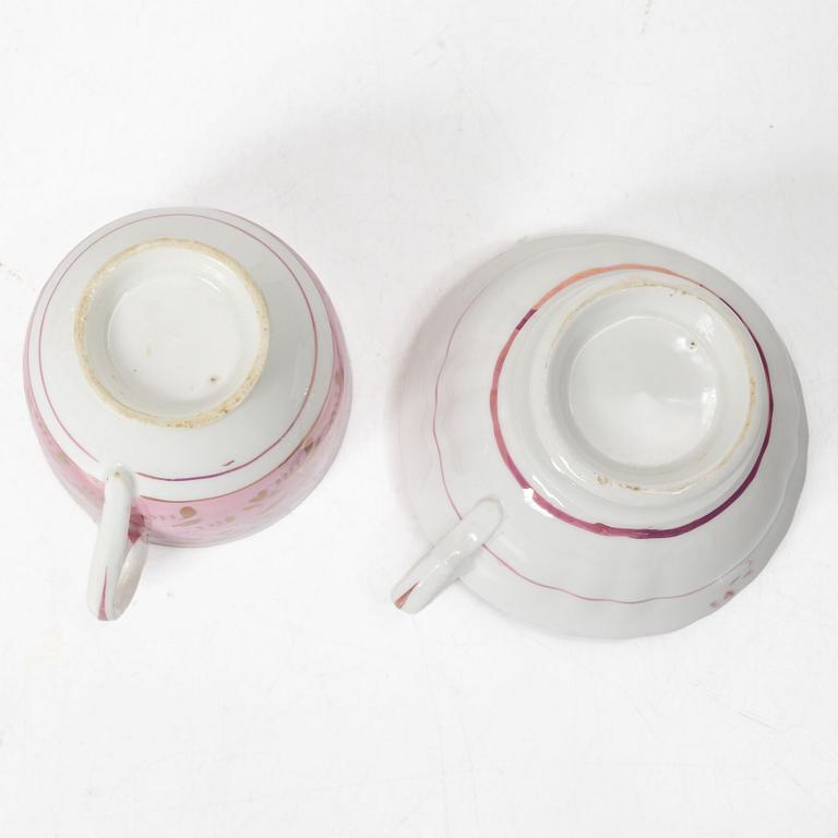 Twelve cups and saucers, England, 19th century.