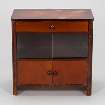 A 1930s functionalist style chest of drawers.