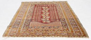 An oriental carpet, c. 195 x 70 cm.