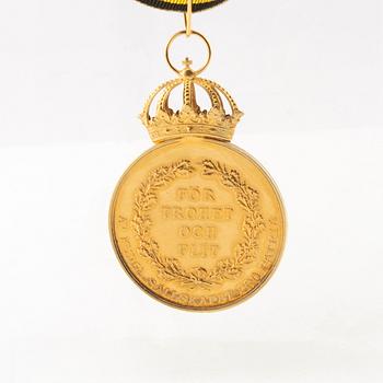 Medalj,  "För trohet och flit", 18K guld, af Kongl. Sällskapet Pro Patria, 1994.