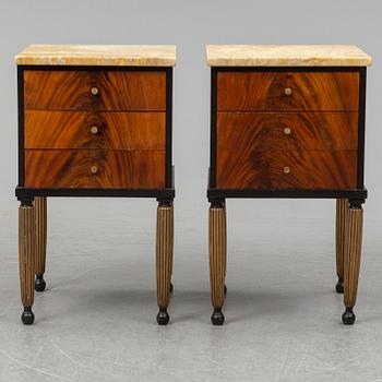 A pair of mid 20th century bedside tables.