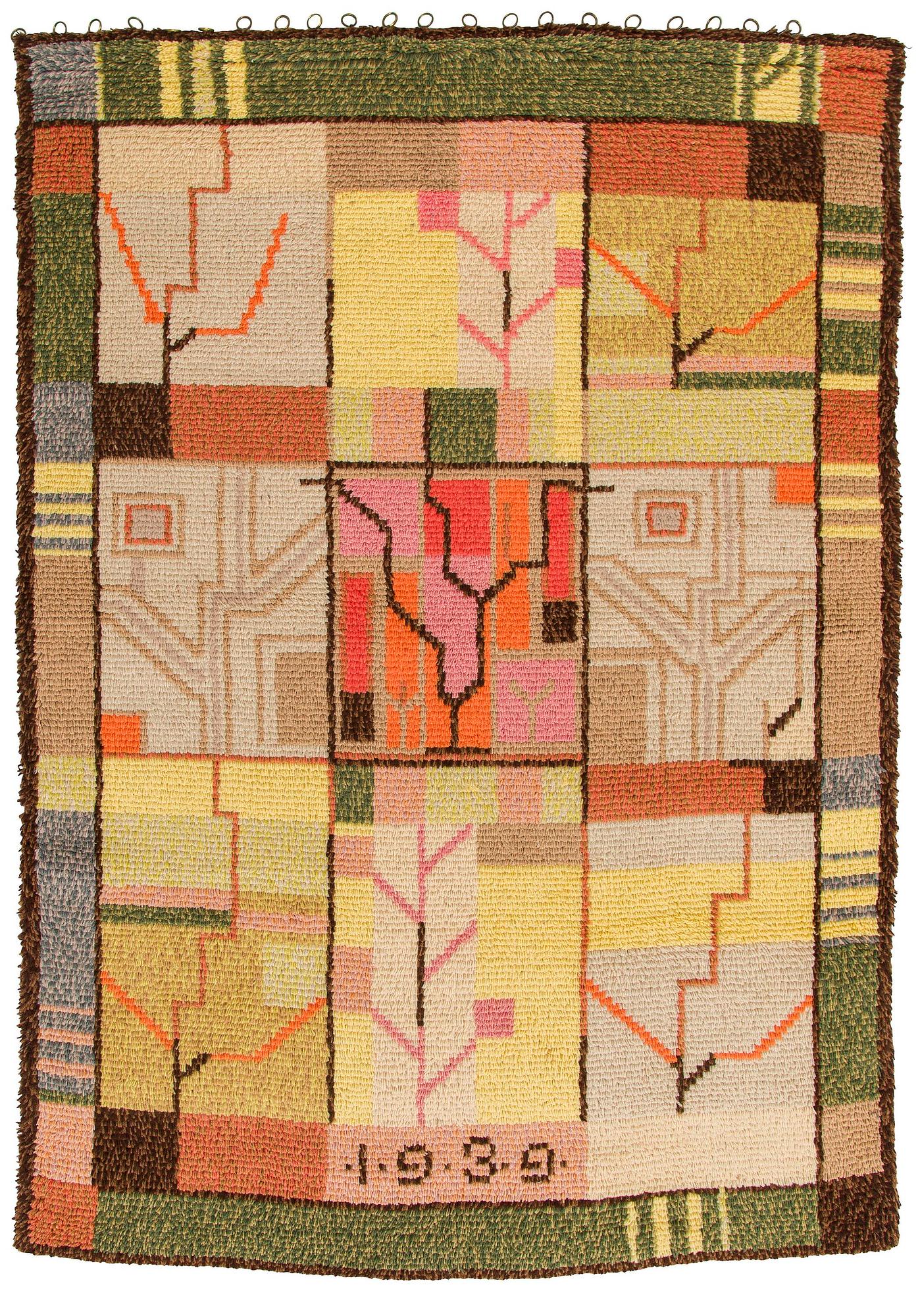 Impi Sotavalta, rya, modell för Finska handarbetets vänner, daterad 1939. Ca  165 x 120 cm.