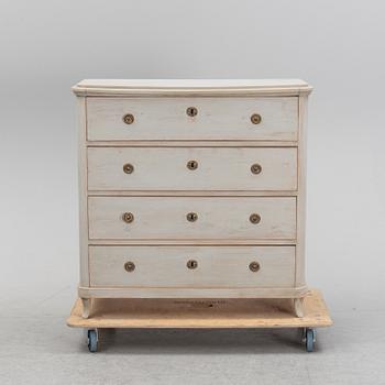 A painted chest of drawers, 19th Century.