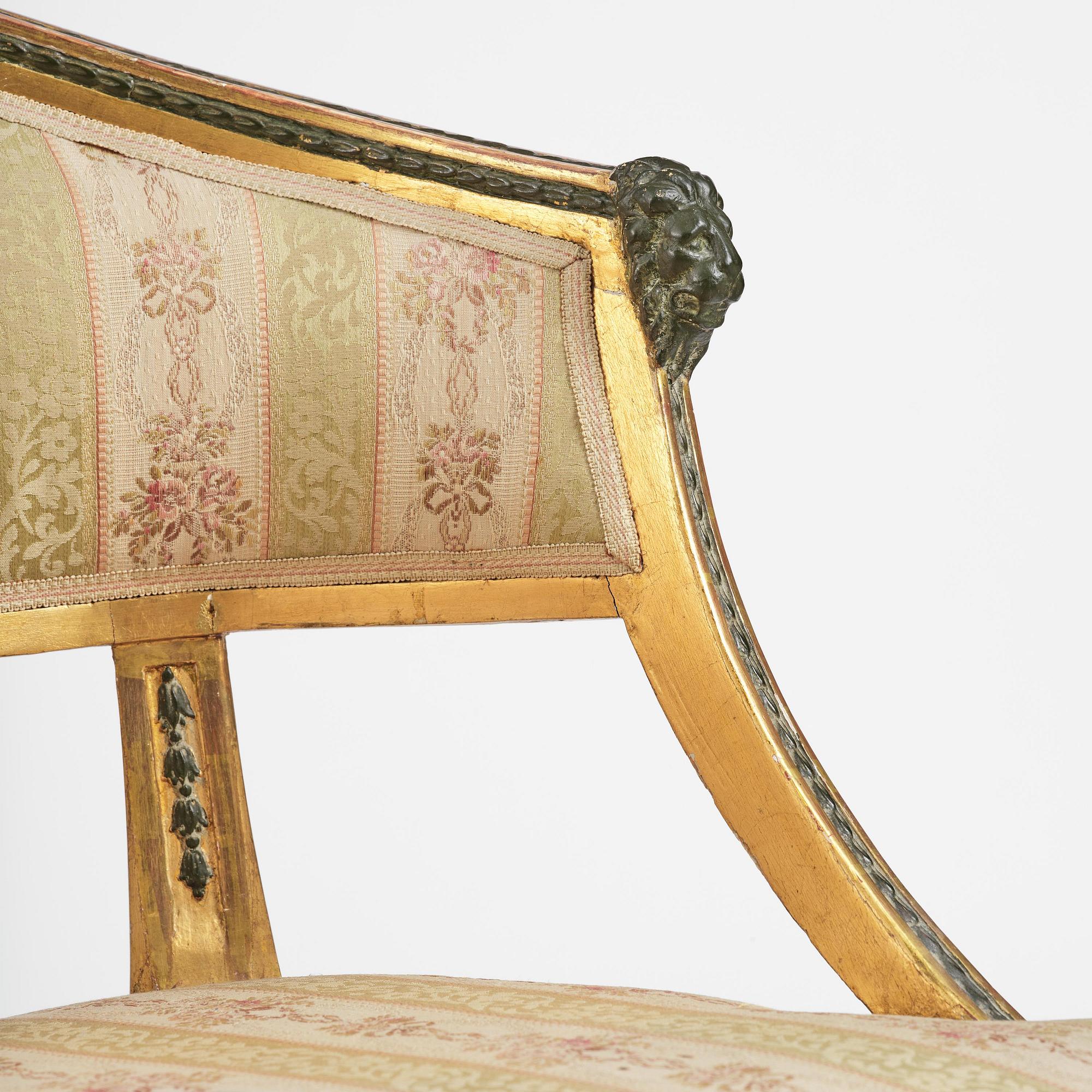 A pair of late Gustavian giltwood open-back armchairs, Stockholm, late 18th century.