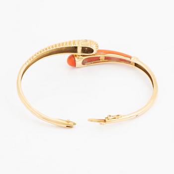 Gold and coral and diamond bangle.