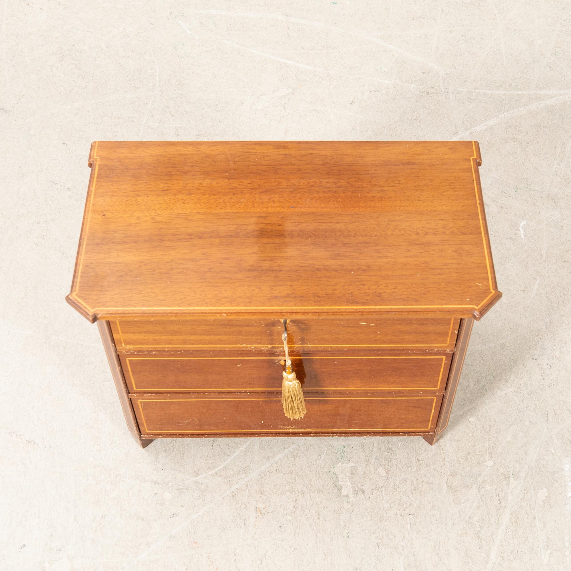 Miniature chest of drawers, early 20th century.