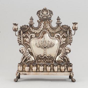 A 19th century silver chanukka-lamp.