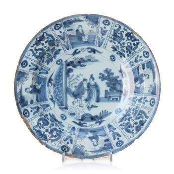 327. A Dutch faience dinner plate, late 17th Century.