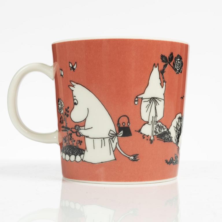 A Moomin mug, 'Dark rosa' with sticker, Arabia, Finland, 1991-99.