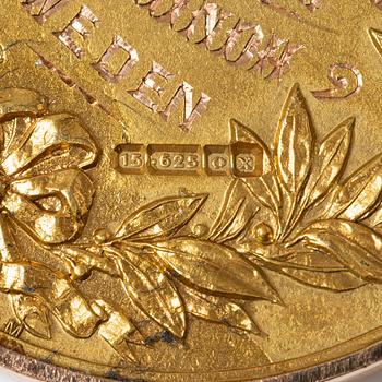 A medal, 15K gold, England, 1922.