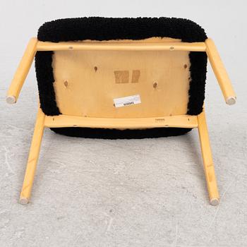 Yngve Ekström, an armchair and a footstool, "Lamino", Swedese, second half of the 20th century.