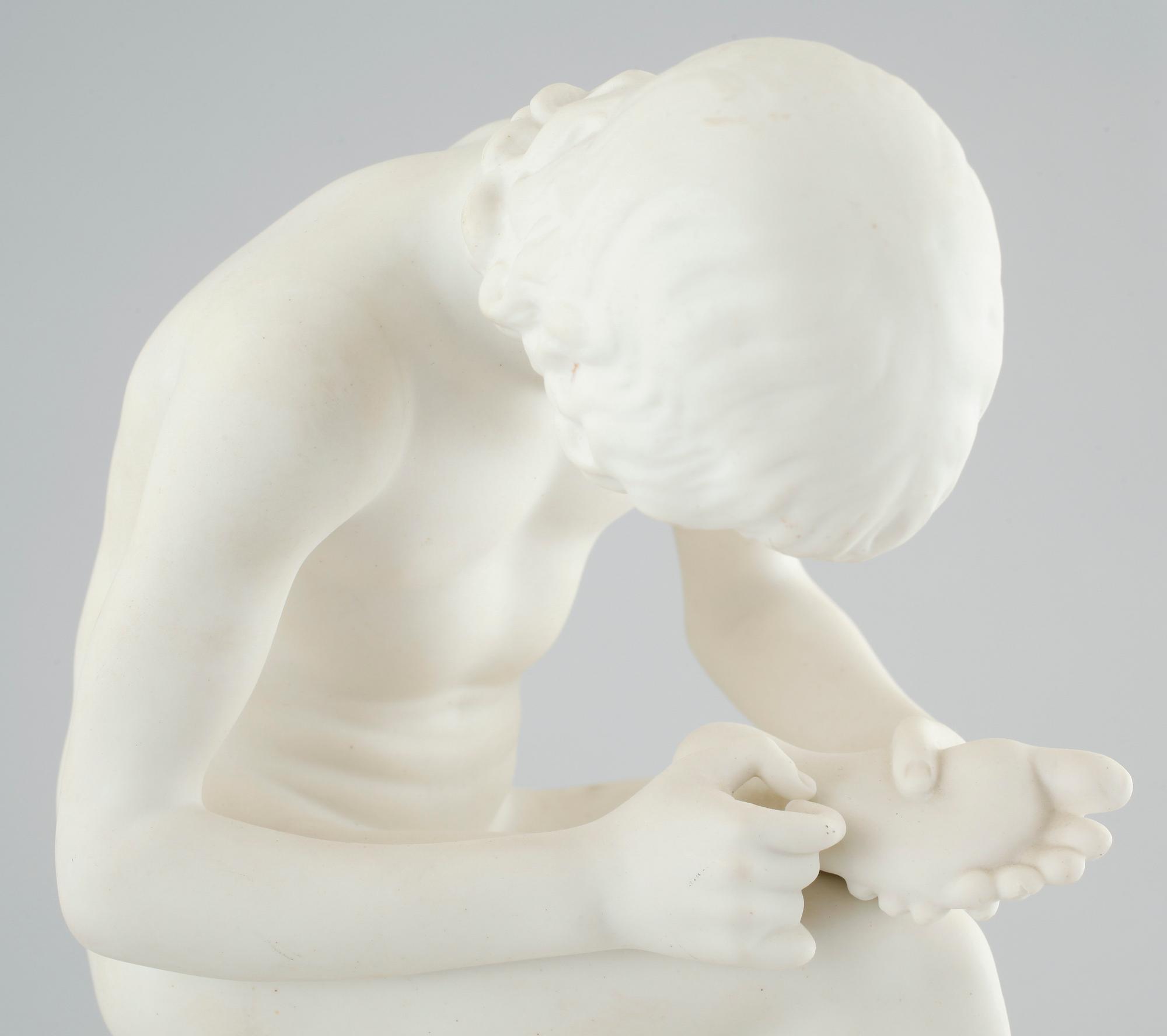 FIGURIN, parian, Gustavsberg, märkt Cop. GE samt daterad 1901 i godset.