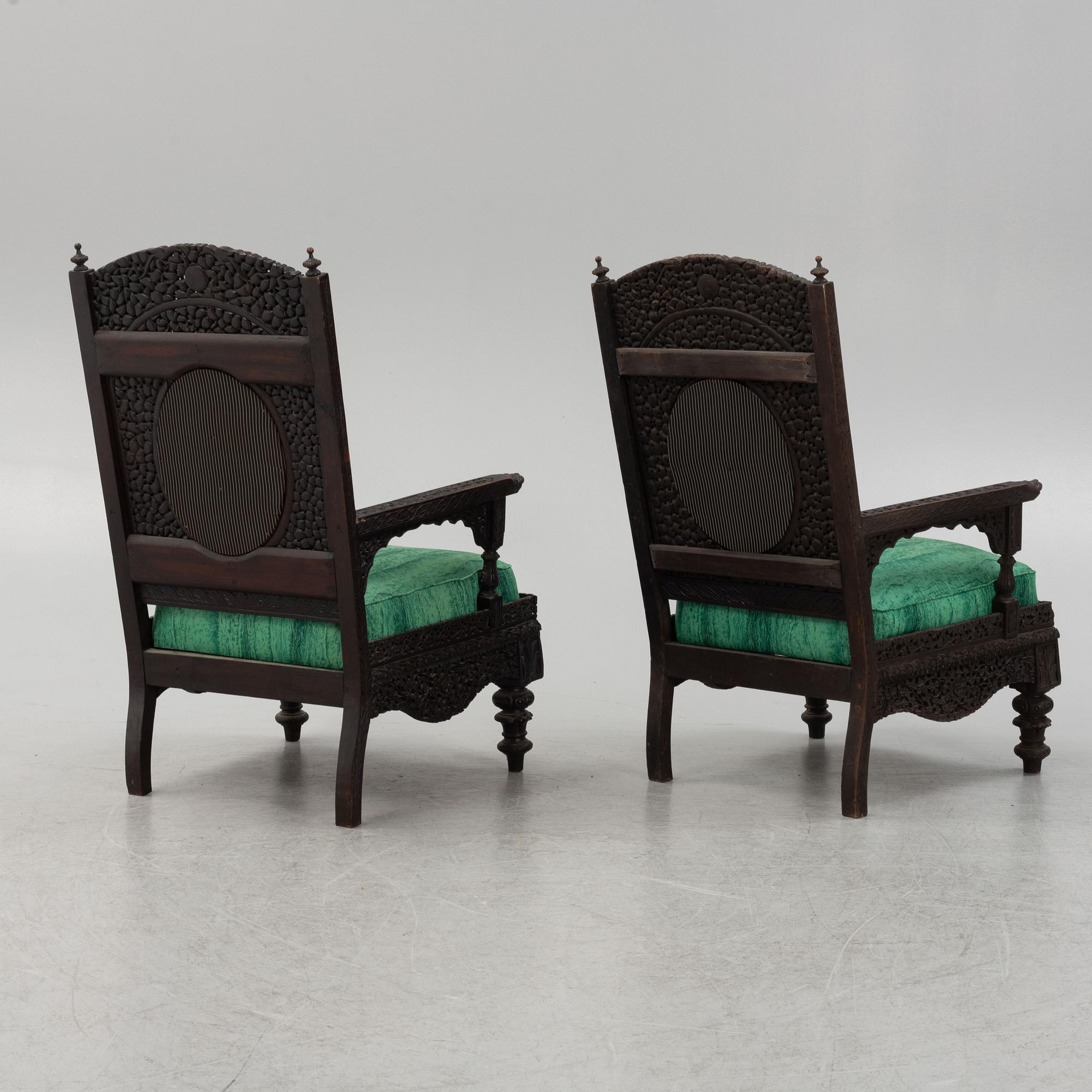 A pair of Angloindian carved chairs, India, 19th century, in so called 'Bombay style'.