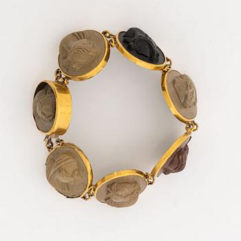 Gold and lava cameo bracelet.
