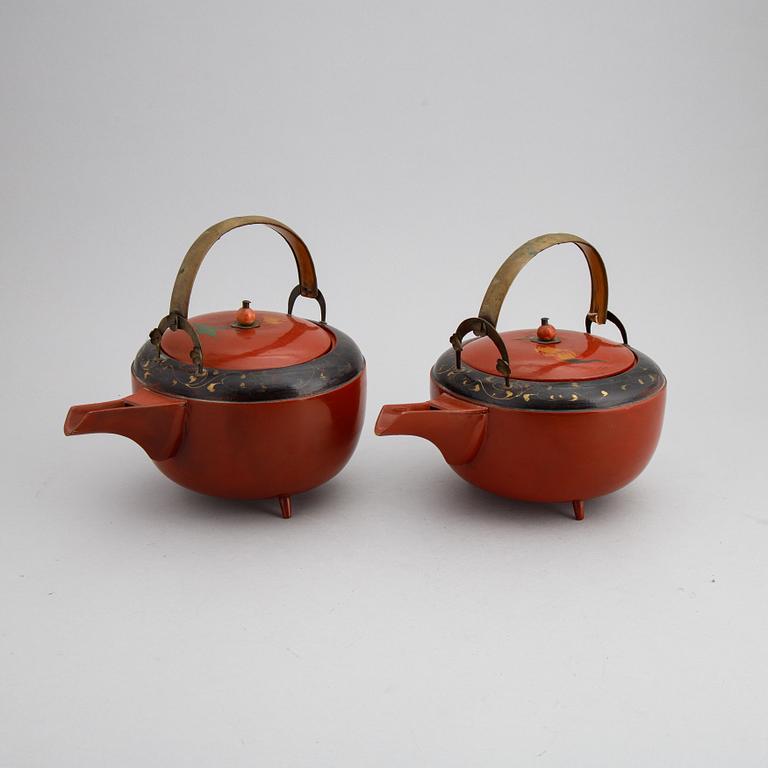 A pair of Japanese red lacquer pots, presumably Meiji (1868-1912).