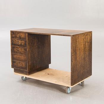 A 1930s birch desk.