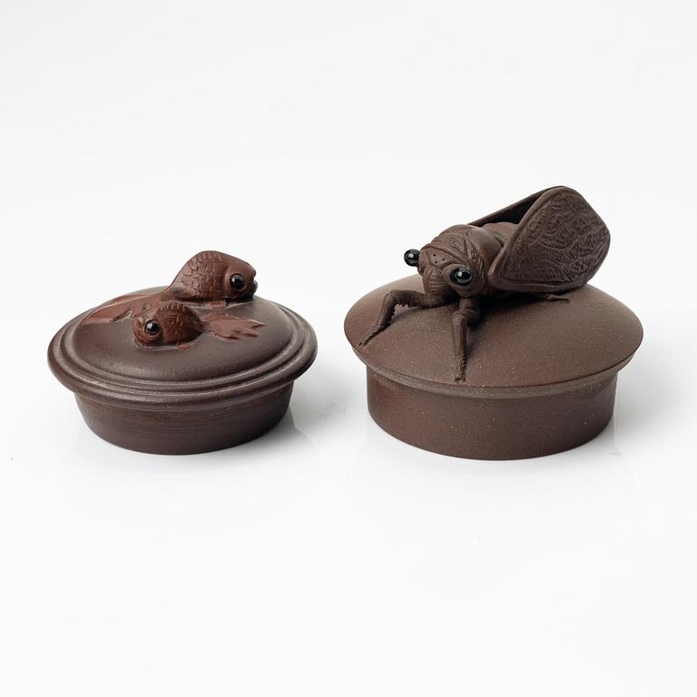 Two yixing teapots, China, 1980s and 2000.