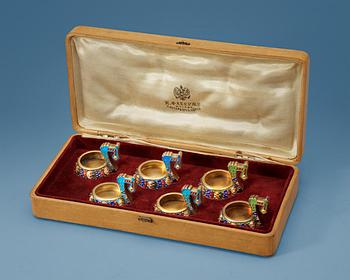 Aﾠsetﾠof sixﾠFabergé silver-gilt and cloisonnéﾠenamelﾠ miniature kovshi,ﾠworkmaster Feodor Rückert, Moscow 1908-1917.