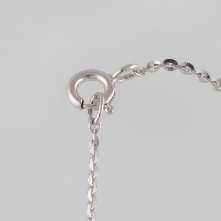 ARMBAND, 18K guld och vitguld med briljantslipade diamanter ca 0.07 ct. Vikt 2,0 gram.