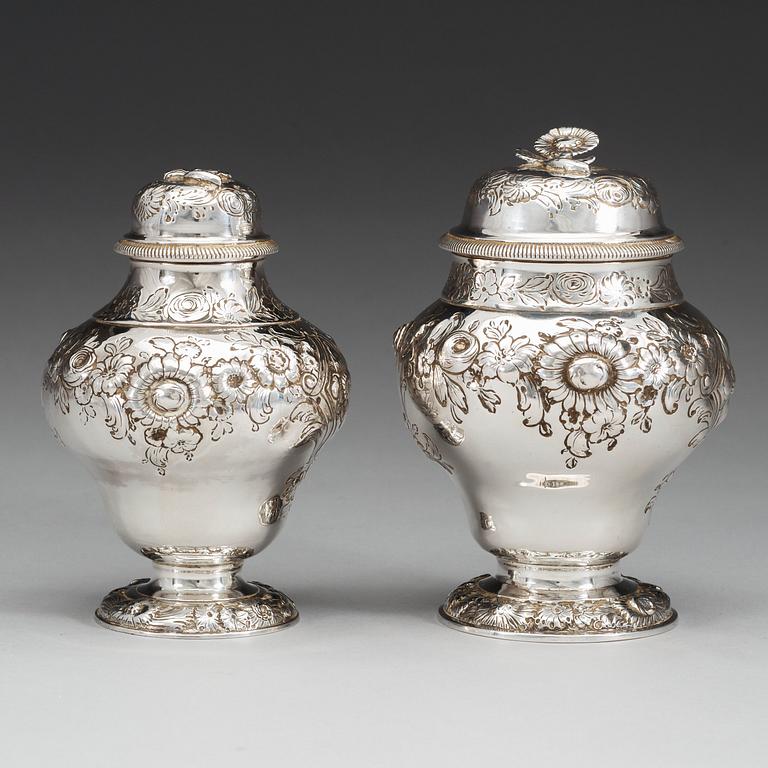 An English 18th century silver tea caddie and sugar vase, marks of George Ibbot, London 1754.