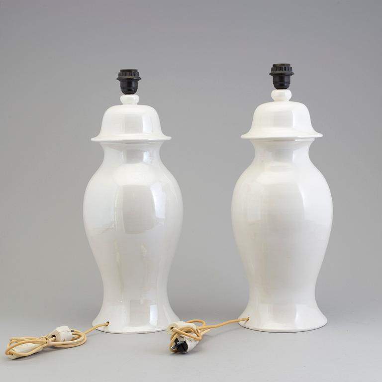 A pair of white ceramic table lamps bu Tommaso Barbi, Italy, 1970.