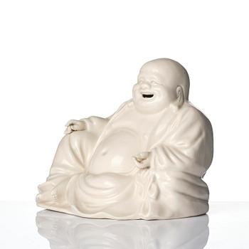 A blanc de chine figure of Budai, Qing dynasty, 18/19th century.
